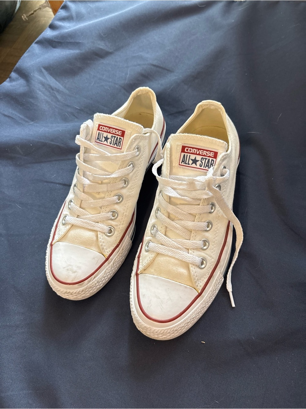 Converse All Star Low Top Sneakers in White with Red Trim